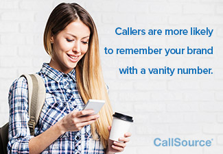 Woman looking at cell phone holding coffee