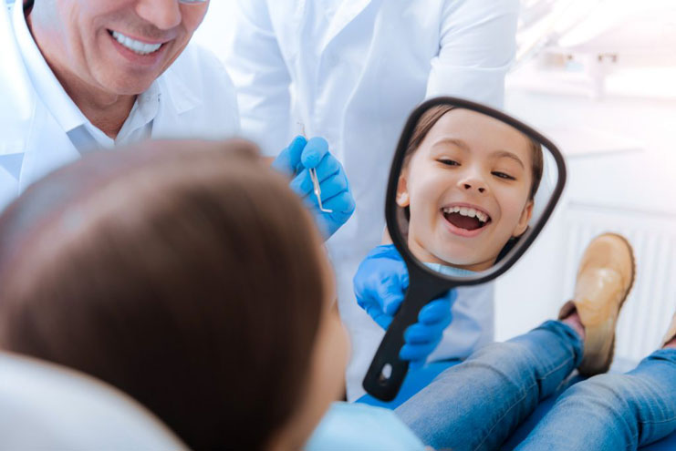 dental-child-smiling-in-chair